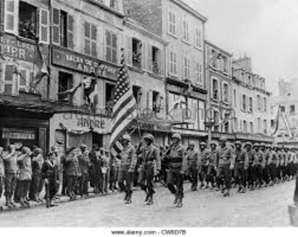U.S. troops liberate Cherbourg, France.