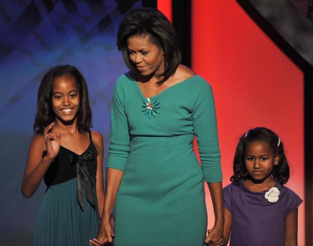 Her first child, Malia Ann, is born.