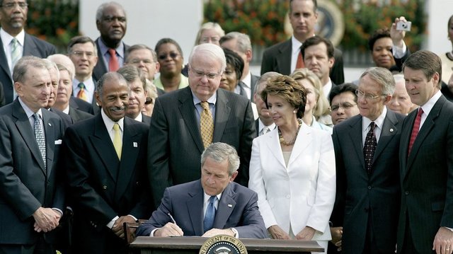 President Bush signs the Civil rights act