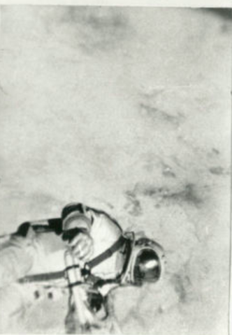 Alexei Leonov performs the first spacewalk