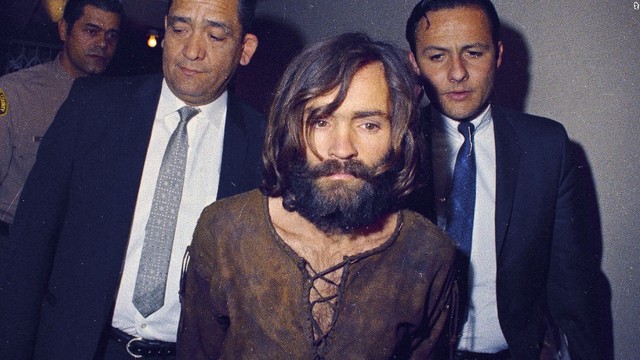 Forrest sees the arrest of Charles Manson on the News