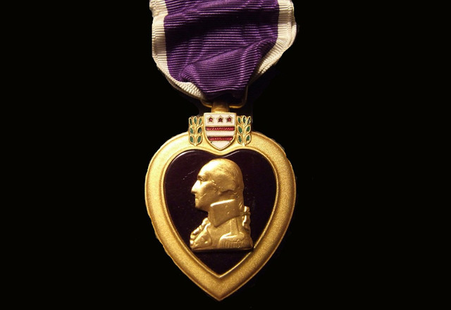 He is awarded a Purple Heart