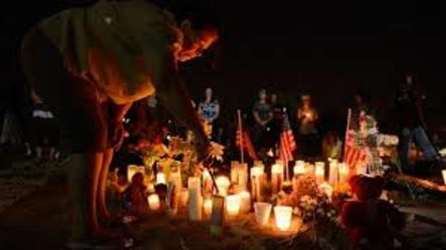 Gunman kills 12 injures 58 at a movie theater in Aurora Colorado