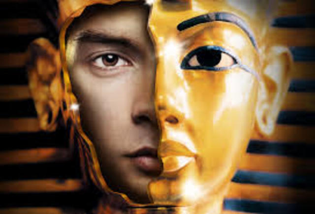 king tut comes to the throne when he is nine