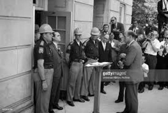 Witnesses Racial Integration at University of Alabama with George Wallace speaking.