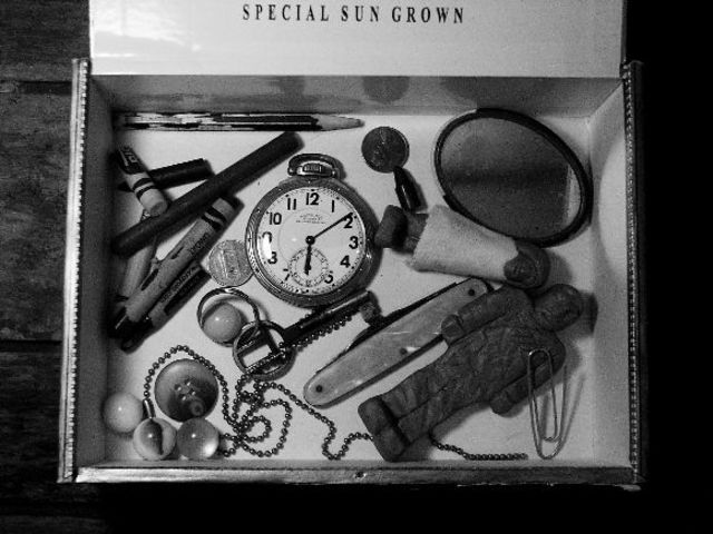 Jem and Scout find a small box containing two pennies