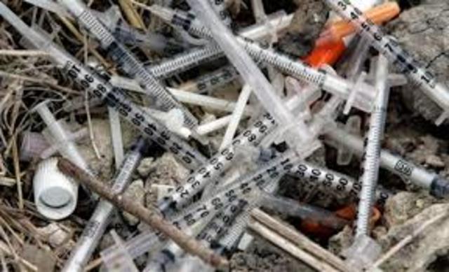 hypodermics on the shore