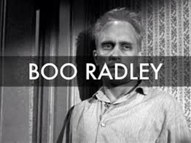 Boo stabs Ewell and Scout walks him home