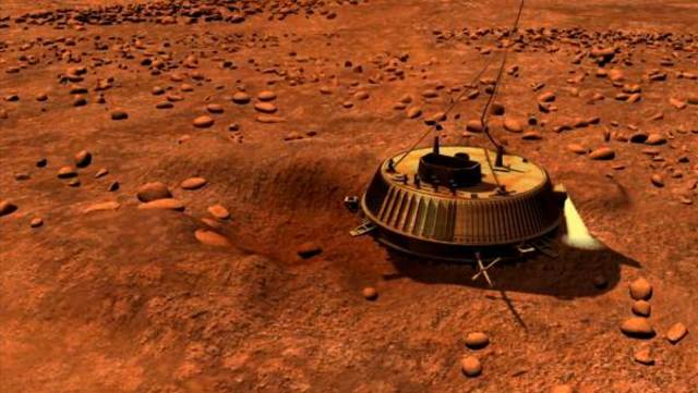 la sonda huygens-casini se posa sobre titan, satélite de saturno