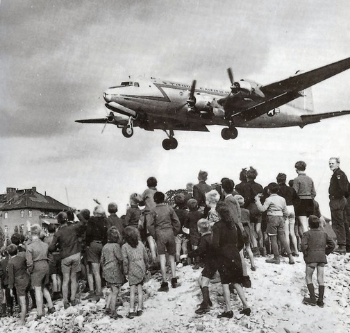 1948- Berlin airlift shows American resolve against the spread of communism and soviet aggression.