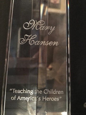 Receiving my Teacher of the Year Crystal from Director Brady and Dr. Curtis