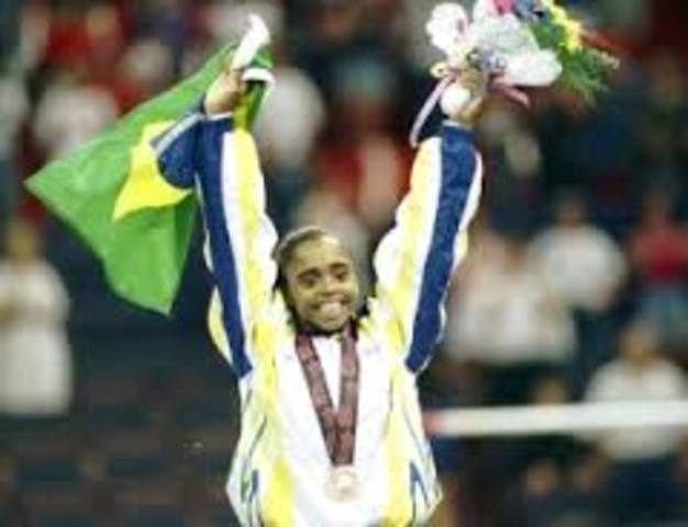 2003-  Daiane dos Santos se torna a primeira brasileira a ganhar o campeonato mundial da modalidade.