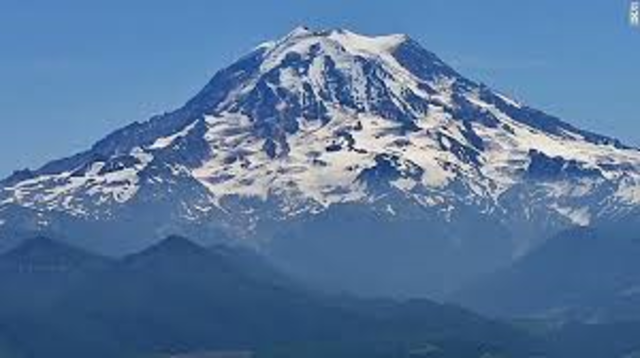 Climbs Mount Rainier, Washington