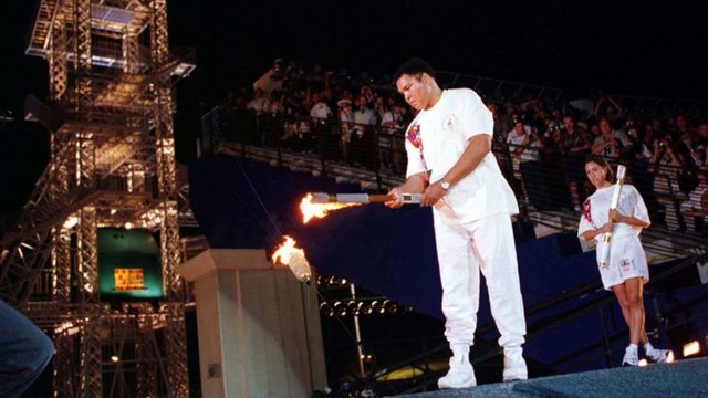 Con la antorcha olimpica en Atlanta 1996
