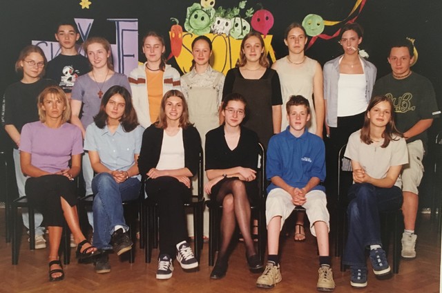 The very last eighth grade graduates.