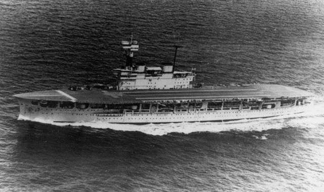 HMS Eagle suffers an accidental bomb explosion while off the Nicobar Islands