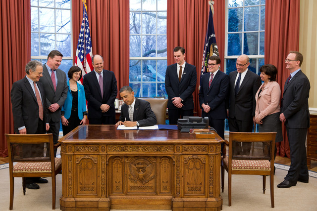President Obama signs the Affordable Care Act
