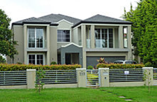 Painted and rendered triple fronted brick veneer, Australia