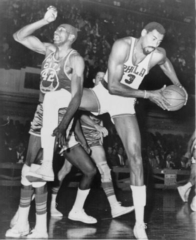 Wilt Chamberlain of NBA Philadelphia Warriors scored 67 points vs. New York.