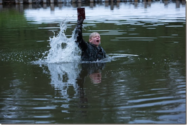 Viktor throws The Whistler into the water