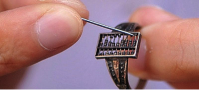 Abacus ring