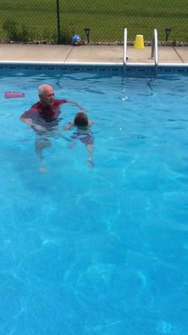 Caleb learns how to swim