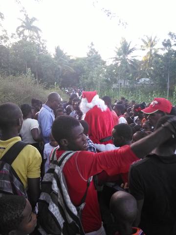 Christmas gifts are distributed to the children on Bainet