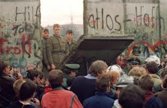 Berlin Wall is demolished.