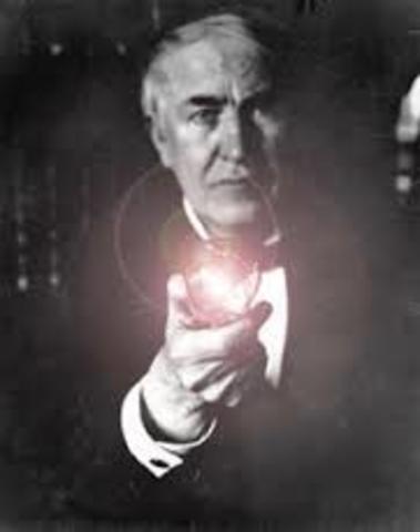 Edison perfects incandescent light bulb
