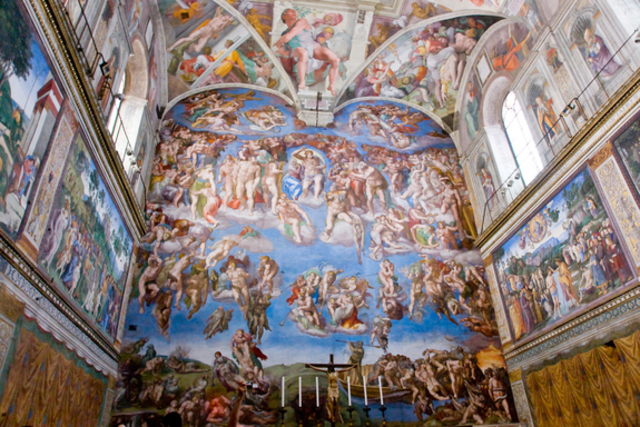 Michelangelo begins painting Sistine Chapel