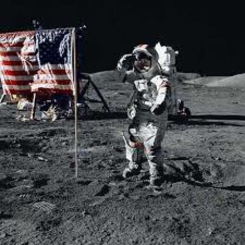 The world sees Neil Armstrong walk on the moon from their televisions
