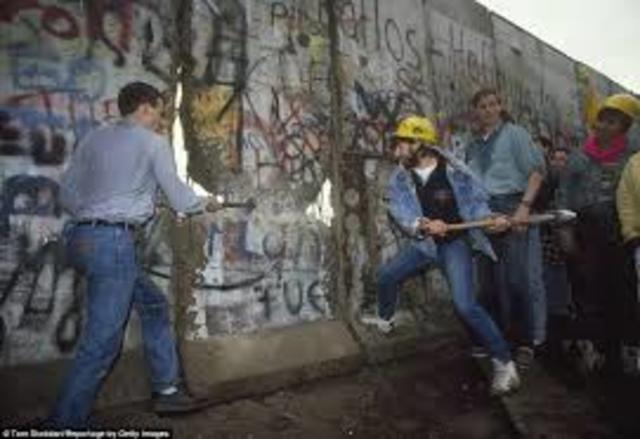 Berlin Wall is demolished.