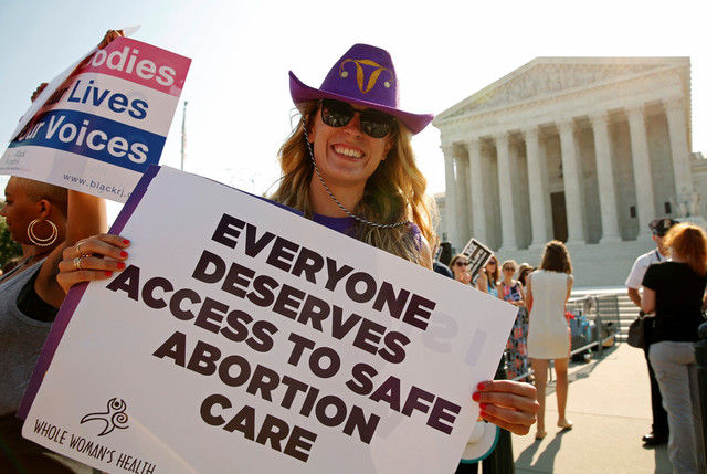The Supreme Court establishes a woman's right to safe and legal abortion