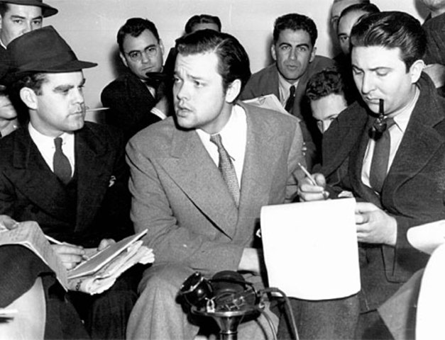 Orson Welles broadcasts the war of the worlds
