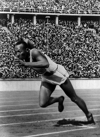 Jesse Owens wins four gold medals at the Germany Olympics