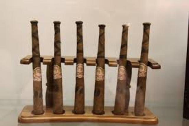 The first baseball bat