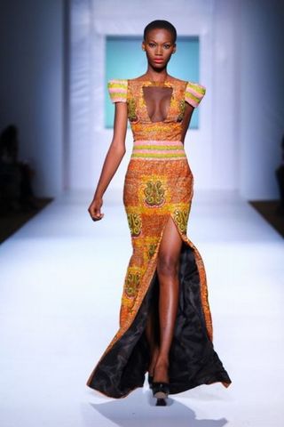 Asagai comes to see Beneatha from Africa and gave her a dress