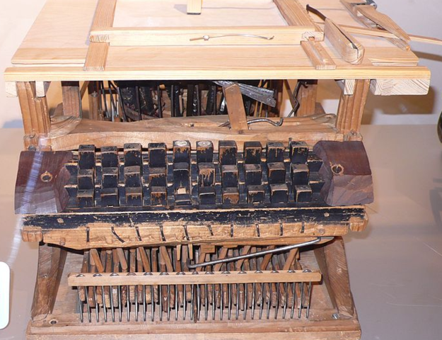A keyboard made out of wood and knives?
