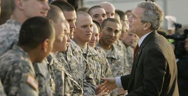 Bush announces a plan to station 21,500 additional troops in Iraq.