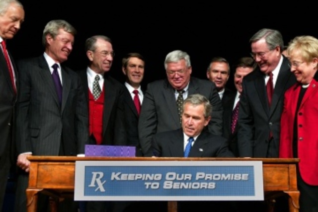 George W. Bush Signs Bill to Provide Changes in Medicare
