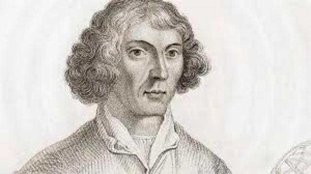 Nicolaus Copernicus publishes a theory