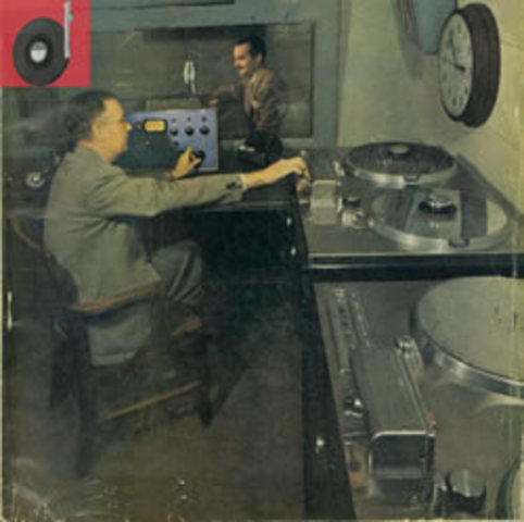 Recording engineer uses an Ampex tape recorder