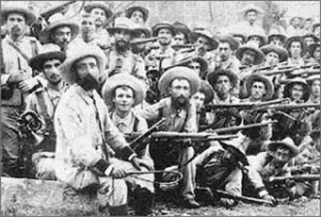 El general Wilson causa importantes bajas españolas, ocupa Coamo y contiúa hacia Aibonito, donde encuentra fuerte resistenciaen las colonias de Asomante.