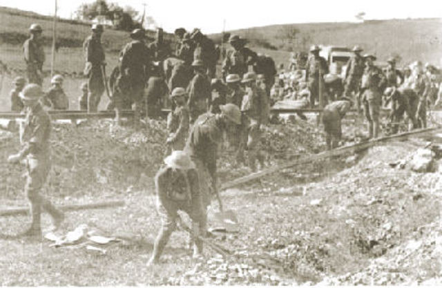 In 1918, The French commander sent American units to evict called Belleau Wood (was covered in barbed wire, artillery, and machine guns.)