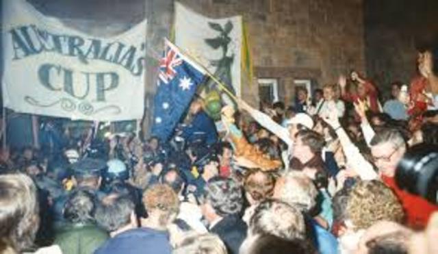 Australia II skippered by John Bertrand defeating Dennis Conner’s Liberty to win the America's Cup .