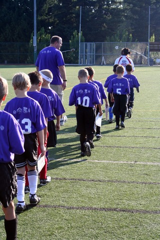 Playing soccer for first time.