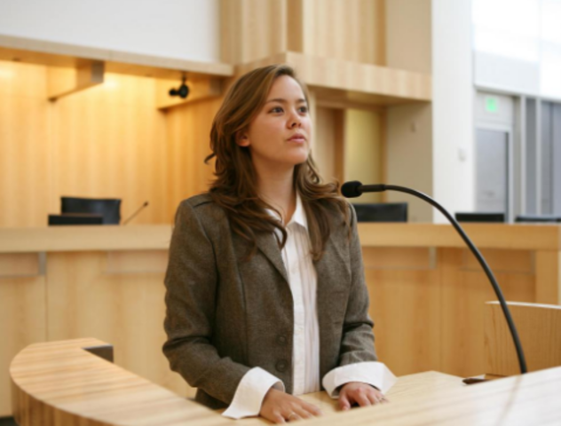 Marie testifies at Meursault's trial.