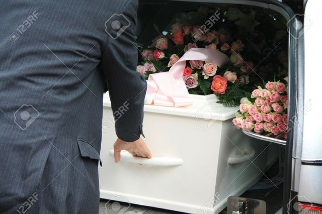 Speaking to the pallbearer at Maman's funeral