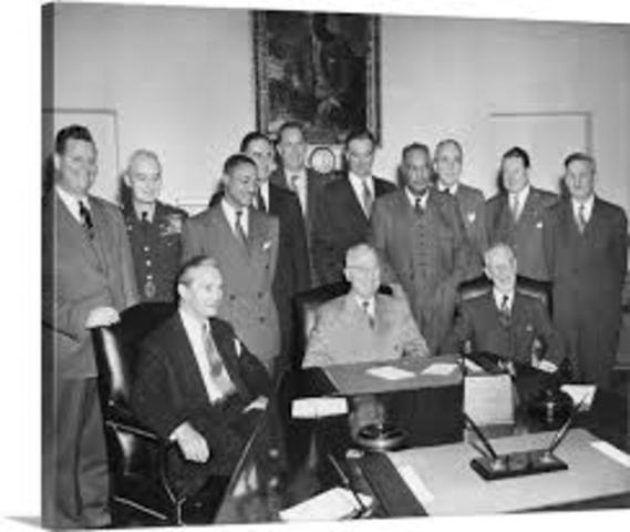 President Truman signing the Executive Order