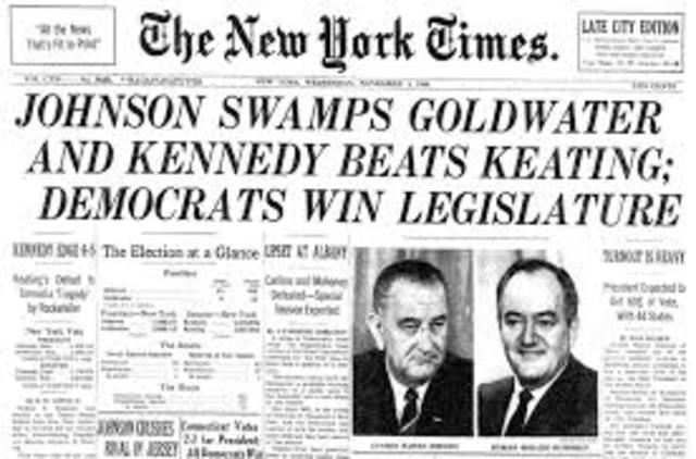 Johnson wins the presidential election in a landslide.